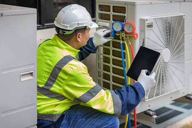 Professional Furnace Repair technician working in Helm, CA